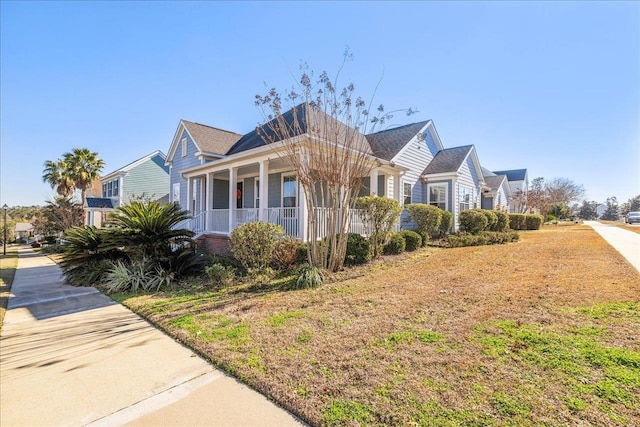 view of front of home featuring a front lawn