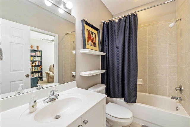 full bathroom featuring toilet, vanity, and shower / tub combo