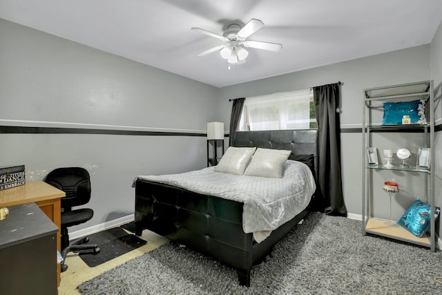 bedroom featuring ceiling fan and carpet flooring