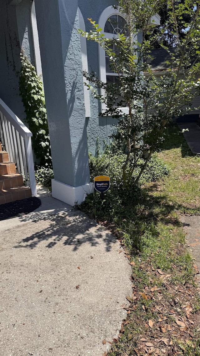 4417 Siesta Ct, Tallahassee, FL 32309 - view of side of home featuring stucco siding