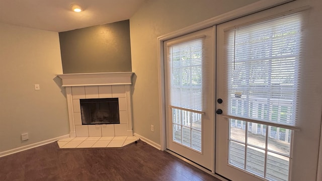 4417 Siesta Ct, Tallahassee, FL 32309 - unfurnished living room featuring a fireplace, baseboards, and wood finished floors