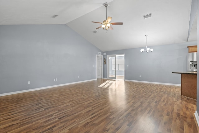 unfurnished living room featuring ceiling fan with notable chandelier, dark wood-type flooring, and high vaulted ceiling