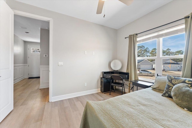 bedroom featuring light hardwood / wood-style floors and ceiling fan