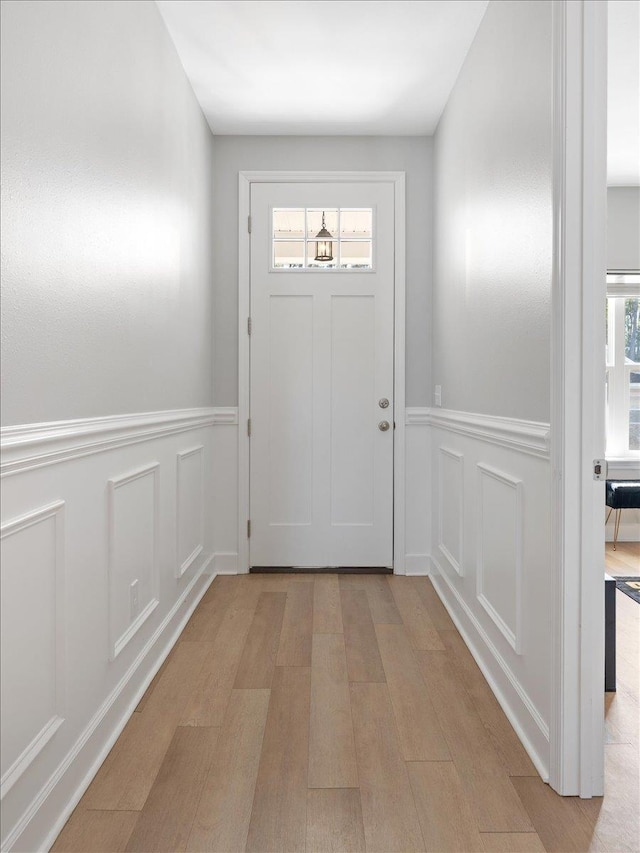 doorway to outside featuring light wood-type flooring