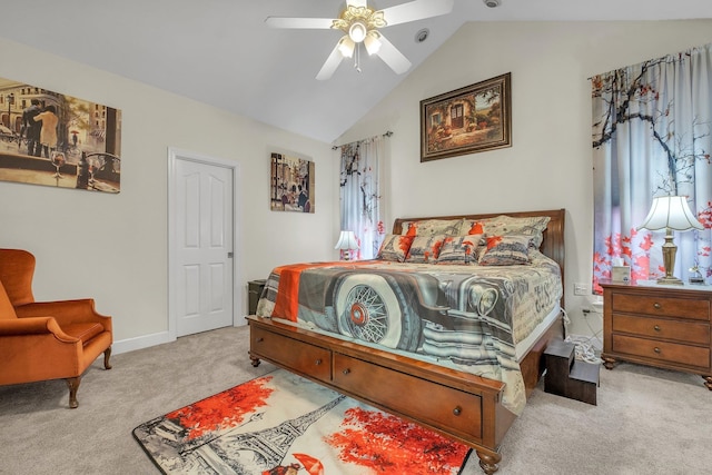 bedroom featuring vaulted ceiling, light carpet, and ceiling fan