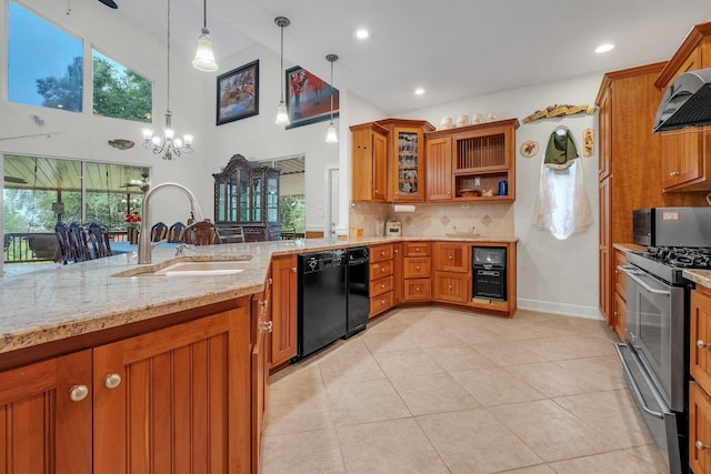 2875 Cooks Landing Rd, Quincy, FL 32351 - kitchen featuring stainless steel gas stove, a sink, dishwasher, brown cabinetry, and decorative backsplash