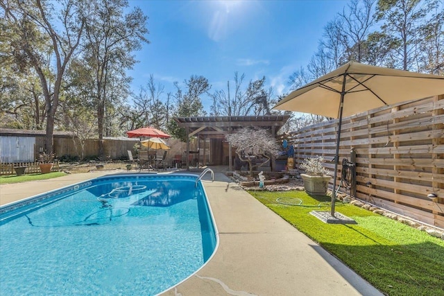 view of pool with a pergola