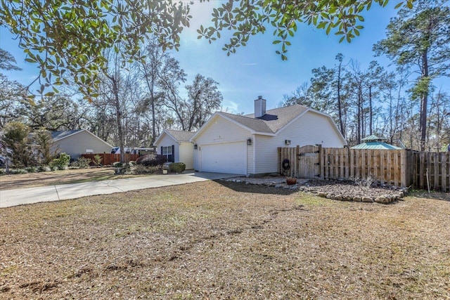 view of side of home with a garage