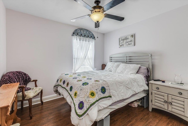 bedroom featuring dark wood-type flooring and ceiling fan