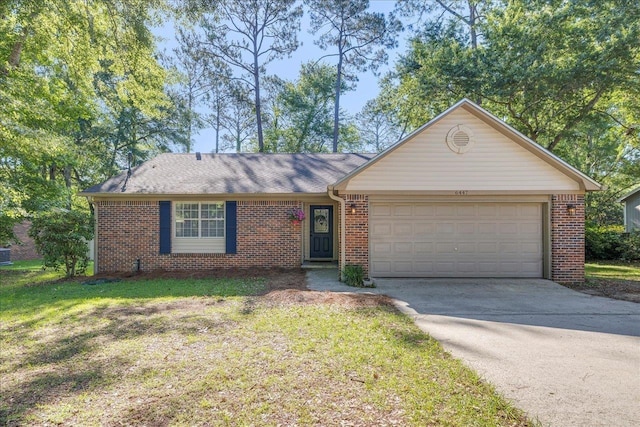 6447 Joe Cotton Trl, Tallahassee, FL 32309 - single story home with brick siding, an attached garage, and concrete driveway
