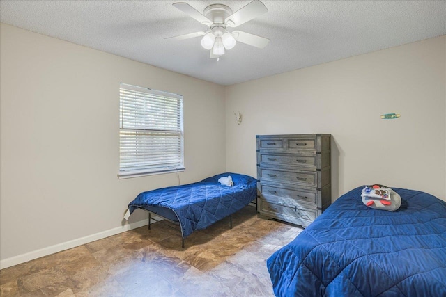 6447 Joe Cotton Trl, Tallahassee, FL 32309 - bedroom featuring ceiling fan, baseboards, and a textured ceiling