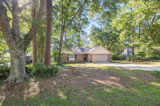 6447 Joe Cotton Trl, Tallahassee, FL 32309 - ranch-style home featuring driveway, a garage, and brick siding