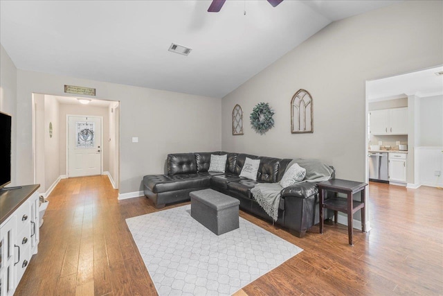 6447 Joe Cotton Trl, Tallahassee, FL 32309 - living room featuring wood finished floors, ceiling fan, lofted ceiling, and baseboards