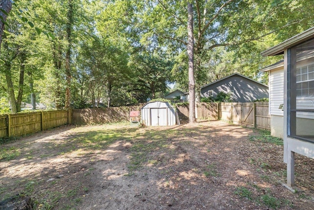 6447 Joe Cotton Trl, Tallahassee, FL 32309 - fenced backyard with a shed and an outbuilding