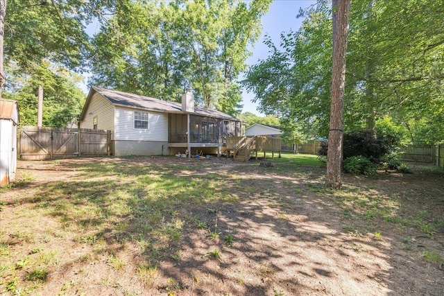 6447 Joe Cotton Trl, Tallahassee, FL 32309 - fenced backyard with a sunroom and a gate