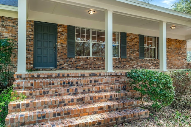 entrance to property with a porch