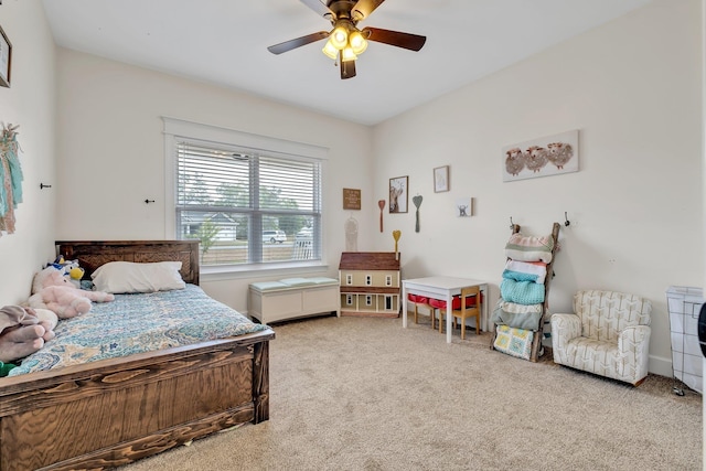 carpeted bedroom featuring a ceiling fan