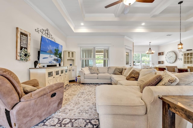 living room with crown molding, light wood-style flooring, ceiling fan with notable chandelier, and beam ceiling