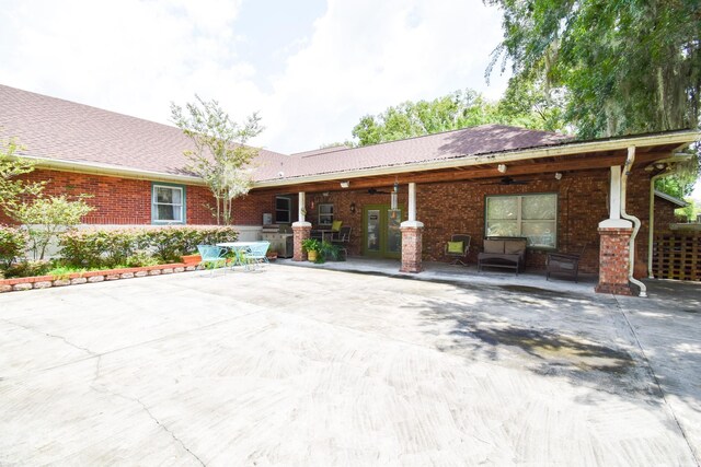 ranch-style house with a patio area