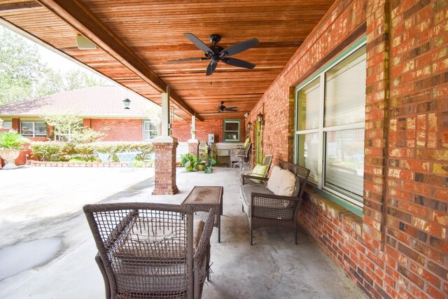 view of patio / terrace featuring ceiling fan