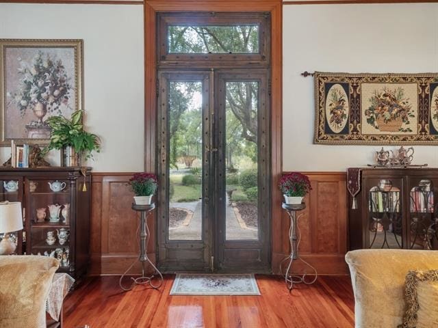 doorway to outside featuring wood-type flooring