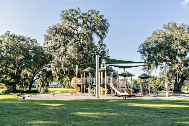 view of jungle gym with a lawn