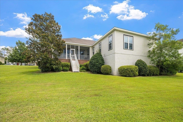 view of front of property with a porch and a front yard