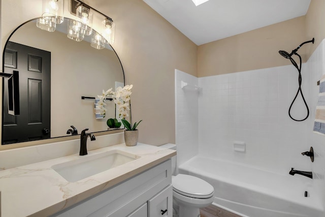 full bath with shower / washtub combination, vanity, and toilet