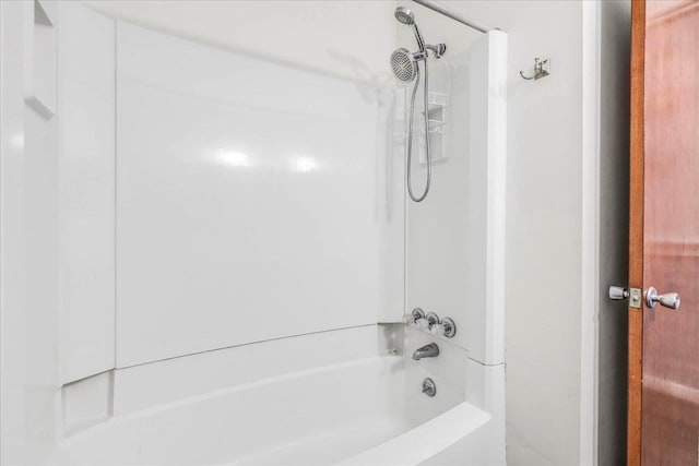 bathroom with shower / tub combination