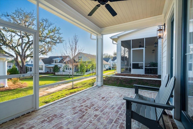190 Camellia Oaks Ave Unit 96, Tallahassee, FL 32317 - unfurnished sunroom featuring ceiling fan and a residential view