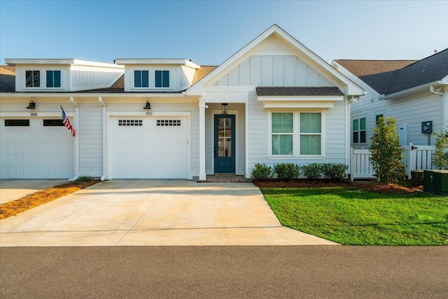 190 Camellia Oaks Ave Unit 96, Tallahassee, FL 32317 - view of front of property with concrete driveway, an attached garage, board and batten siding, and a shingled roof