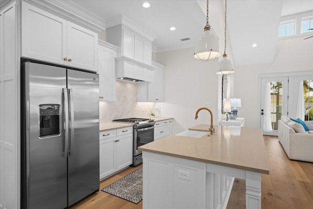 190 Camellia Oaks Ave Unit 96, Tallahassee, FL 32317 - kitchen with stainless steel appliances, plenty of natural light, backsplash, light wood finished floors, and recessed lighting