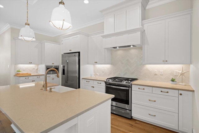 190 Camellia Oaks Ave Unit 96, Tallahassee, FL 32317 - kitchen with appliances with stainless steel finishes, crown molding, white cabinets, tasteful backsplash, and recessed lighting