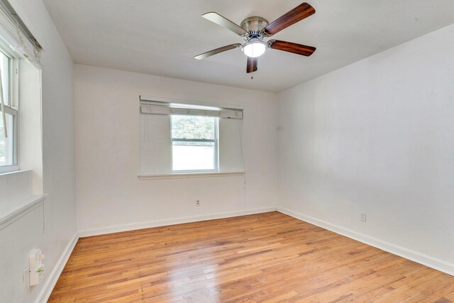 unfurnished room featuring ceiling fan and light hardwood / wood-style flooring