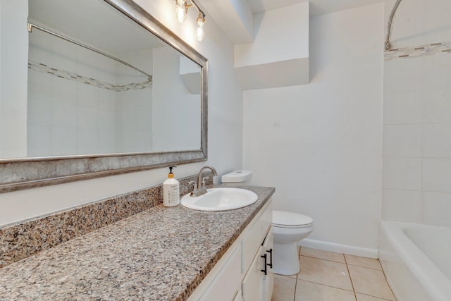 full bathroom with tile patterned flooring, vanity, toilet, and tiled shower / bath