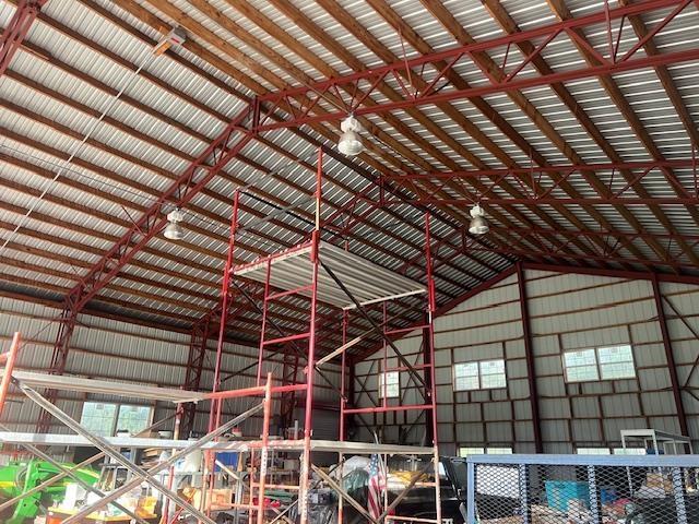 interior space with plenty of natural light and high vaulted ceiling