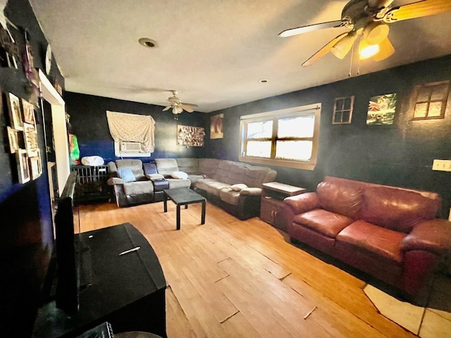 living room with light hardwood / wood-style flooring