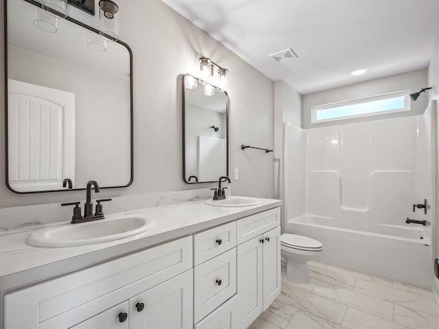 full bathroom with toilet, vanity, and shower / bathing tub combination