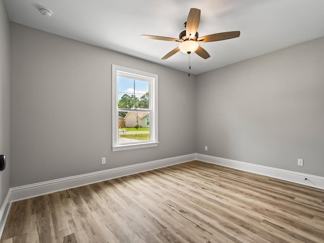 unfurnished room featuring ceiling fan and light hardwood / wood-style floors