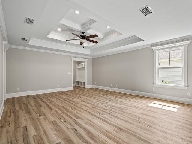 spare room with beamed ceiling, coffered ceiling, ceiling fan, crown molding, and light wood-type flooring