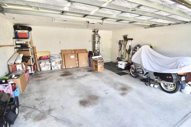 2736 Oakleigh Ct, Tallahassee, FL 32312 - garage featuring strapped water heater