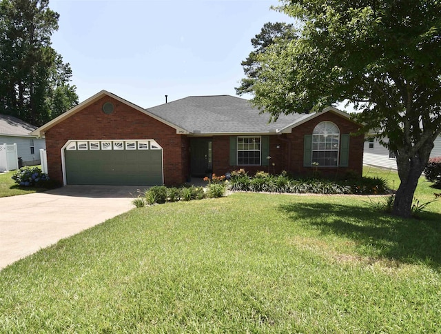 2736 Oakleigh Ct, Tallahassee, FL 32312 - ranch-style house with a garage, a front yard, concrete driveway, and brick siding