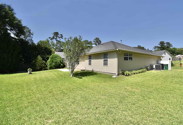 2736 Oakleigh Ct, Tallahassee, FL 32312 - view of side of home with a lawn and central air condition unit