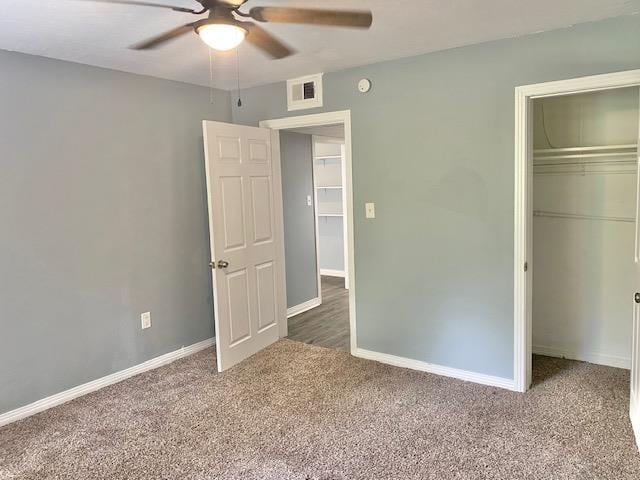 316-328 E Pershing St Unit 316-328, Tallahassee, FL 32301 - unfurnished bedroom with ceiling fan, a closet, and carpet