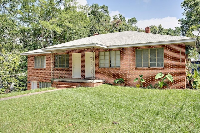 316-328 E Pershing St Unit 316-328, Tallahassee, FL 32301 - view of front facade with a front lawn