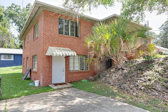 316-328 E Pershing St Unit 316-328, Tallahassee, FL 32301 - view of front of property featuring a front lawn