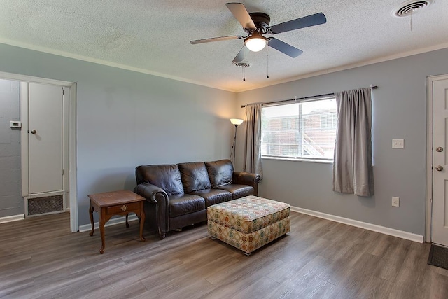 316-328 E Pershing St Unit 316-328, Tallahassee, FL 32301 - living room featuring crown molding, ceiling fan, hardwood / wood-style flooring, and a textured ceiling