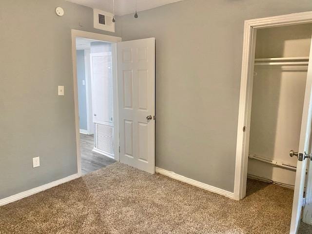 316-328 E Pershing St Unit 316-328, Tallahassee, FL 32301 - unfurnished bedroom featuring carpet flooring and a closet