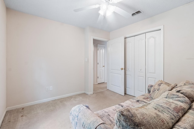 8827 Sapphire Dr, Tallahassee, FL 32309 - living area with carpet, a ceiling fan, and baseboards
