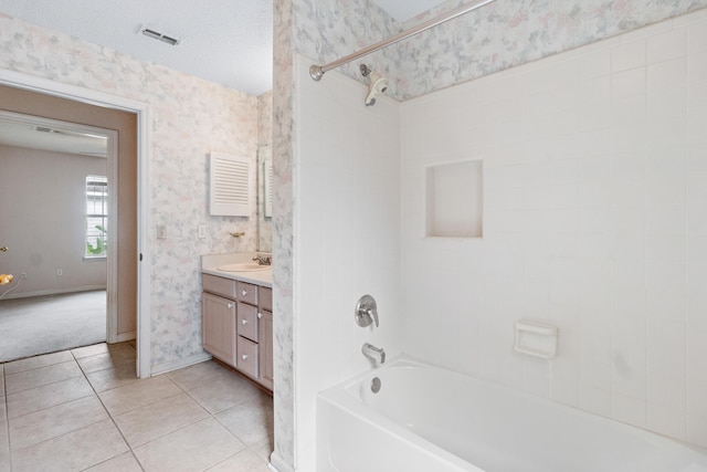 8827 Sapphire Dr, Tallahassee, FL 32309 - bathroom featuring bathtub / shower combination, vanity, wallpapered walls, tile patterned flooring, and baseboards